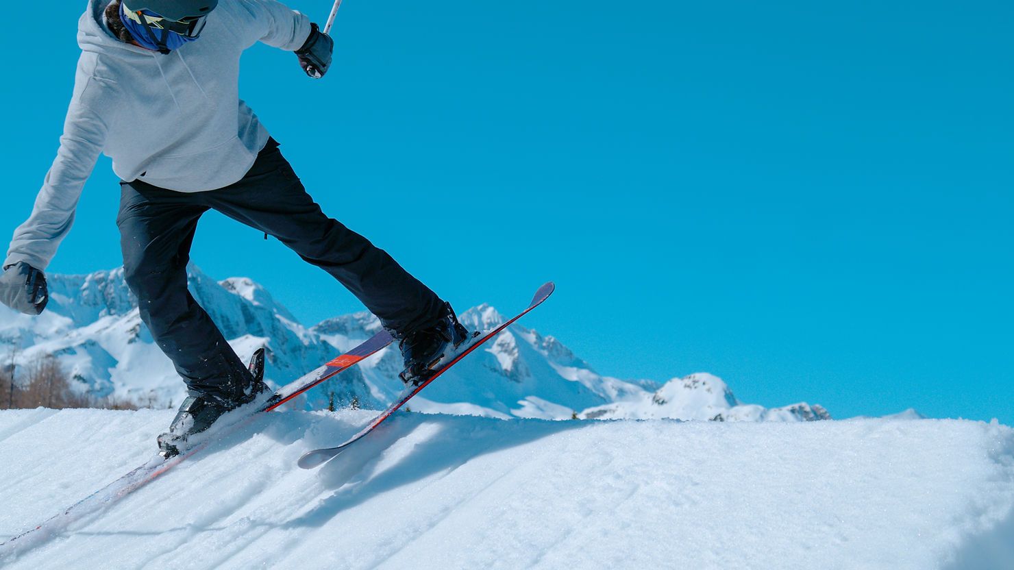 skiier going backwards off a jump